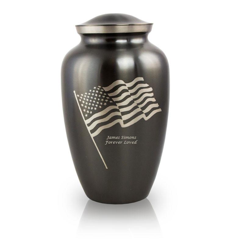 black urn engraved with american flag and text