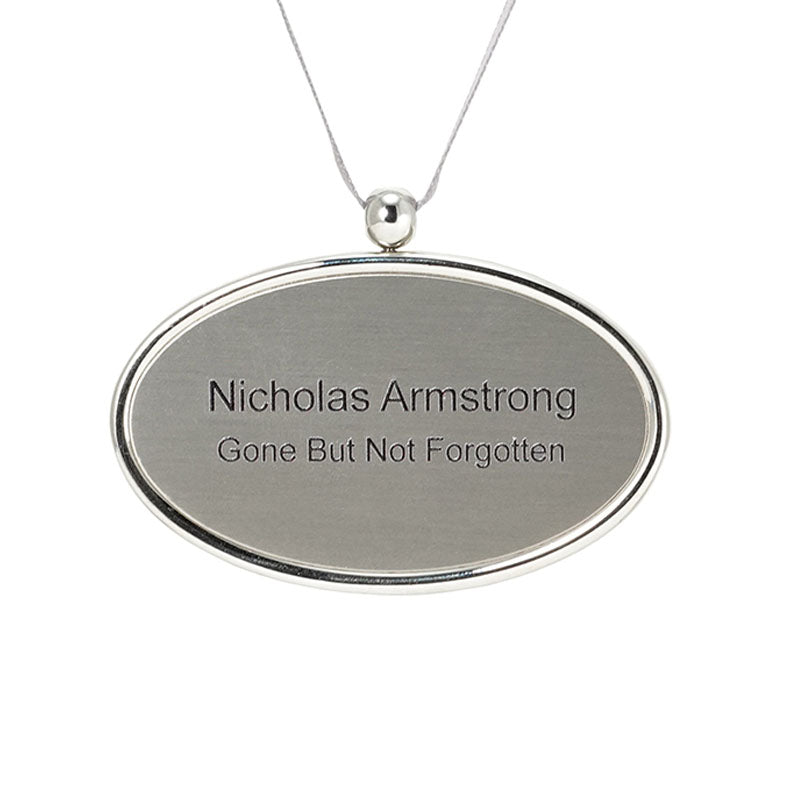 silver urn pendant engraved with text